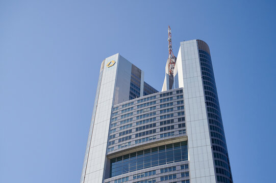 Frankfurt, Germany - March 26, 2022: Commerzbank skyscraper in Frankfurt, Germany. Commerzbank AG is a global banking and financial services company with headquarter in Frankfurt, Germany