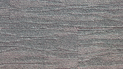 Soft textured fiber gray carpet background