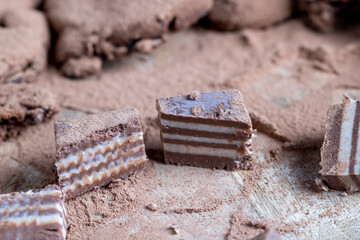 multi-layered sweets made of cream and chocolate layers