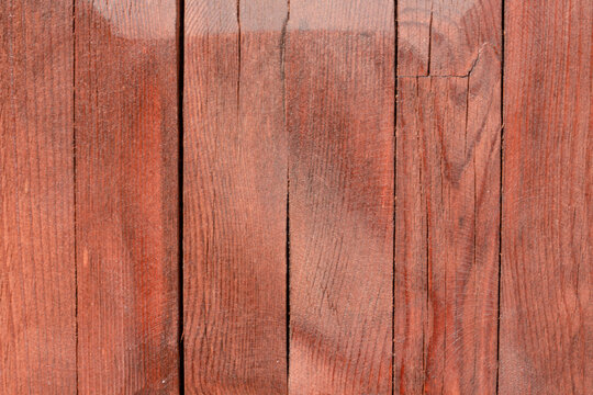  Natural red wood background with vertical strips . 
