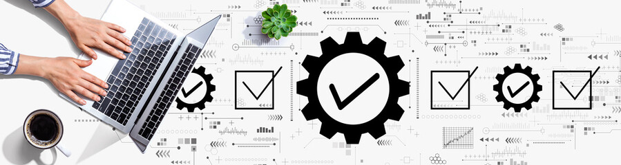 Quality control approval with person using a laptop computer