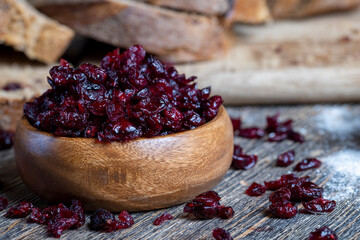 fresh cut bread made of flour and dried cranberries