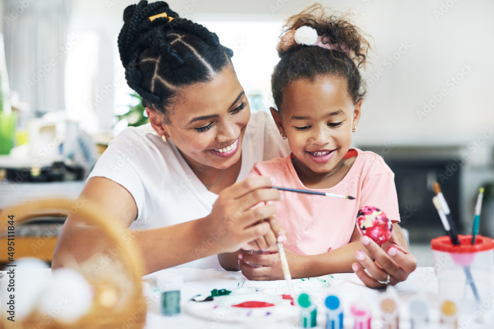 Sticker She have given me everything. Shot of a female painting eggs with her daughter at home.