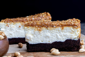 creamy chocolate cake with caramel and roasted peanuts