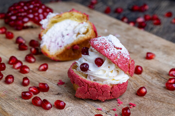 red cranberry-flavored cake with cranberry berries and creamy milk filling