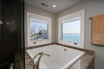 bathroom has be rennovated with modern tiles and fixtures