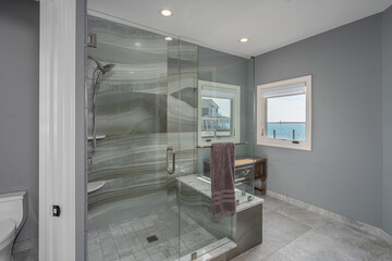 bathroom has be rennovated with modern tiles and fixtures