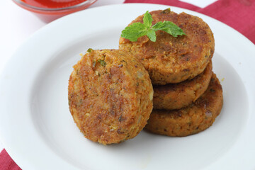 Indian Delicious vegetables  homemade cutlets garnished with mint leaves