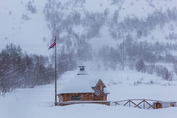 Vesteralen, Norway 02-26-2022. Sauna cabin under snow fall at Vesteralen islands in Norway.