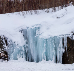 Blue icicles at Vesteralen islands in Norway.