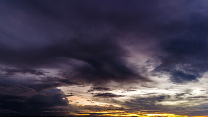 Dramatic sunset in the Sky through cumulus storm clouds, Timelapse. Awesome epic landscape. Amazing vibrant colors, in Goiania, Brazil