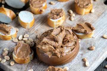 nut food on a cutting wooden board in the kitchen