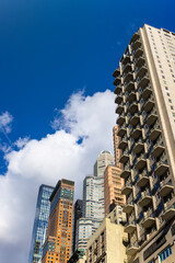 Fototapeta na wymiar Newly built ultra luxury high-rise residential buildings stand among Midtown Manhattan skyscraper on November 03, 2021 in New York City NY USA.