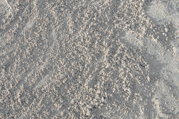 Wet white quartz sand as background