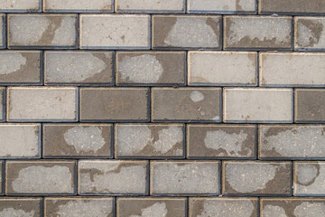 Wet paving slabs as background close-up