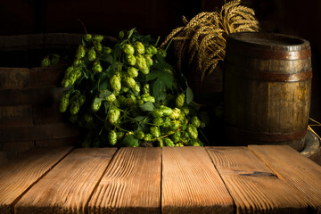 Beer barrel with beer glass on table on wooden background - Powered by Adobe