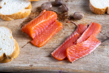 red salted salmon fish meat on a chopping board