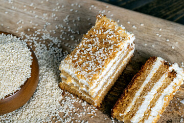 creamy cream and caramel cakes sprinkled with sesame