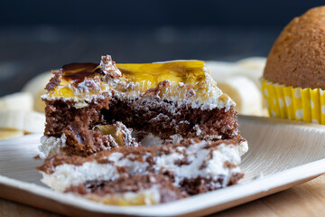 a piece of banana cake and fresh sliced bananas