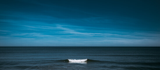 Alone wave on calm sea panoramic seascape view