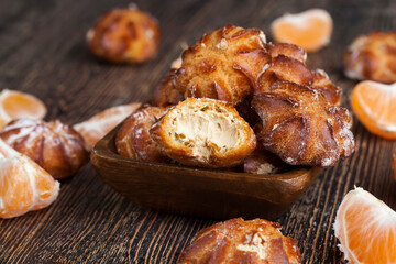 small cakes with custard dough and milk filling