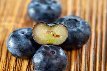 ripe blueberries and blueberries on the table