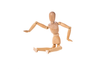 wooden man in a jump spread his arms isolated on a white background. Stretch concept