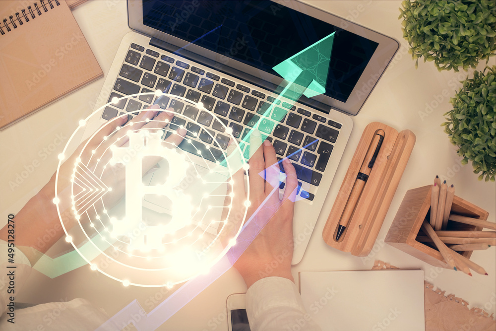 Poster double exposure of woman hands working on computer and blockchain theme hologram drawing. top view. 