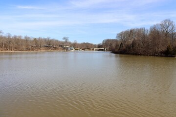 The quiet peaceful lake in the park on a sunny day.