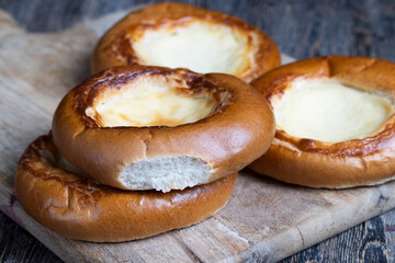 sweet dough pastries with sour cream and milk filling