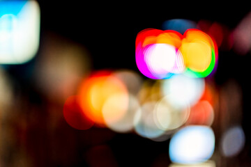 Tokyo, Japan Shinjuku downtown city district ward at night with abstract blurry blurred bokeh background of lights on street urban nightlife shallow depth of field defocused backdrop