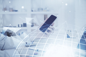 Fototapeta premium Multi exposure of man's hands holding and using a digital device and map drawing. International business concept.