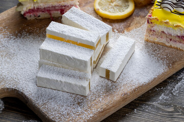 lemon strawberry cake made of several layers of cakes of different flavors
