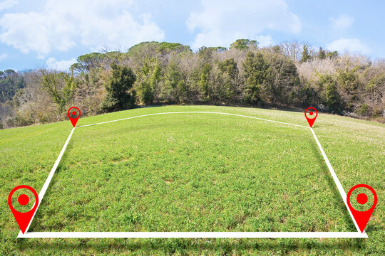 Building lot on hilly land - Land plot management - Real estate concept with a vacant land on a green field available for building construction and housing subdivision in a residential area