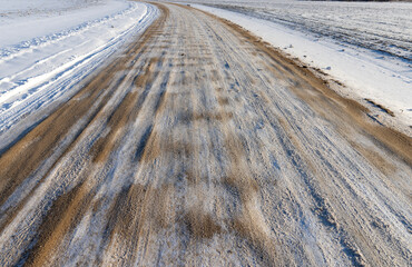 dangerous road in winter after snowfall,