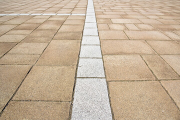 New paving made with stone blocks of rectangular shape in a pede