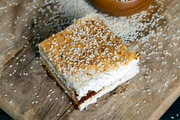 creamy cream and caramel cakes sprinkled with sesame