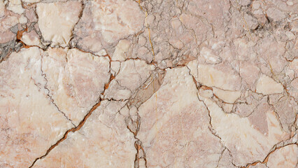 Cracked antique marble texture. Weather-cracked stone wall. Marble stone texture