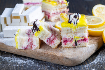lemon strawberry cake made of several layers of cakes of different flavors