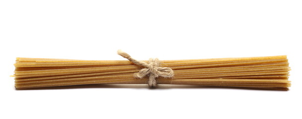 Integral uncooked spaghetti, organic whole wheat pasta isolated on white 