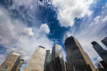 Clouds float over Brookfield skyscraper in Lower Manhattan on October 08, 2021 in New York City NY USA. - obrazy, fototapety, plakaty