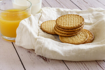 Fototapeta na wymiar Cookies, soy milk and juice for breakfast. Healthy food