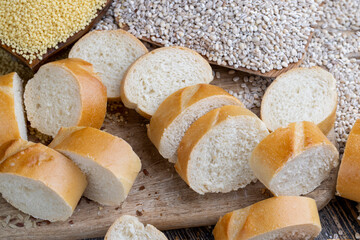 pieces of wheat baguette on a cutting board
