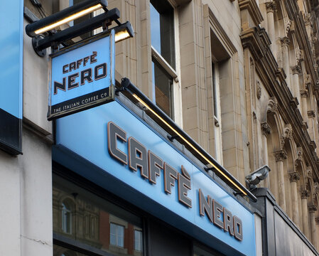 leeds, west yorkshire, united kingdom - 17 march 2022: signs above the front entrance of a cafe nero coffee take away and cafe in leeds city centre