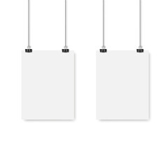 Blank poster hanging on a binder clips. Vector