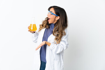 Young scientific woman isolated on white background with surprise expression while looking side