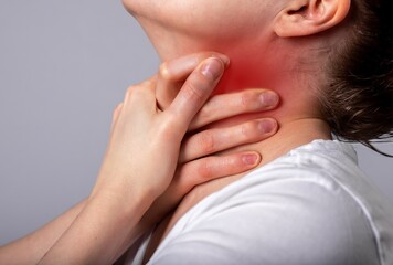 Asthma attack. Woman suffocating, breathing heavily. Sore throat. Hands holding neck with red spot...