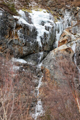 Fototapeta na wymiar Frozen waterfall in the White Mountains in New Hampshire