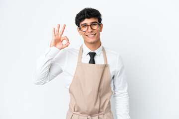 Restaurant Argentinian waiter isolated on white background showing ok sign with fingers