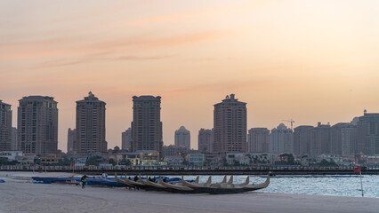 Fototapeta premium Doha, Qatar - March 03,2022 :Beautiful Katara beach during the early morning with mist in the background.
